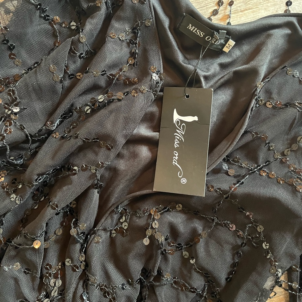 Black sequin romper